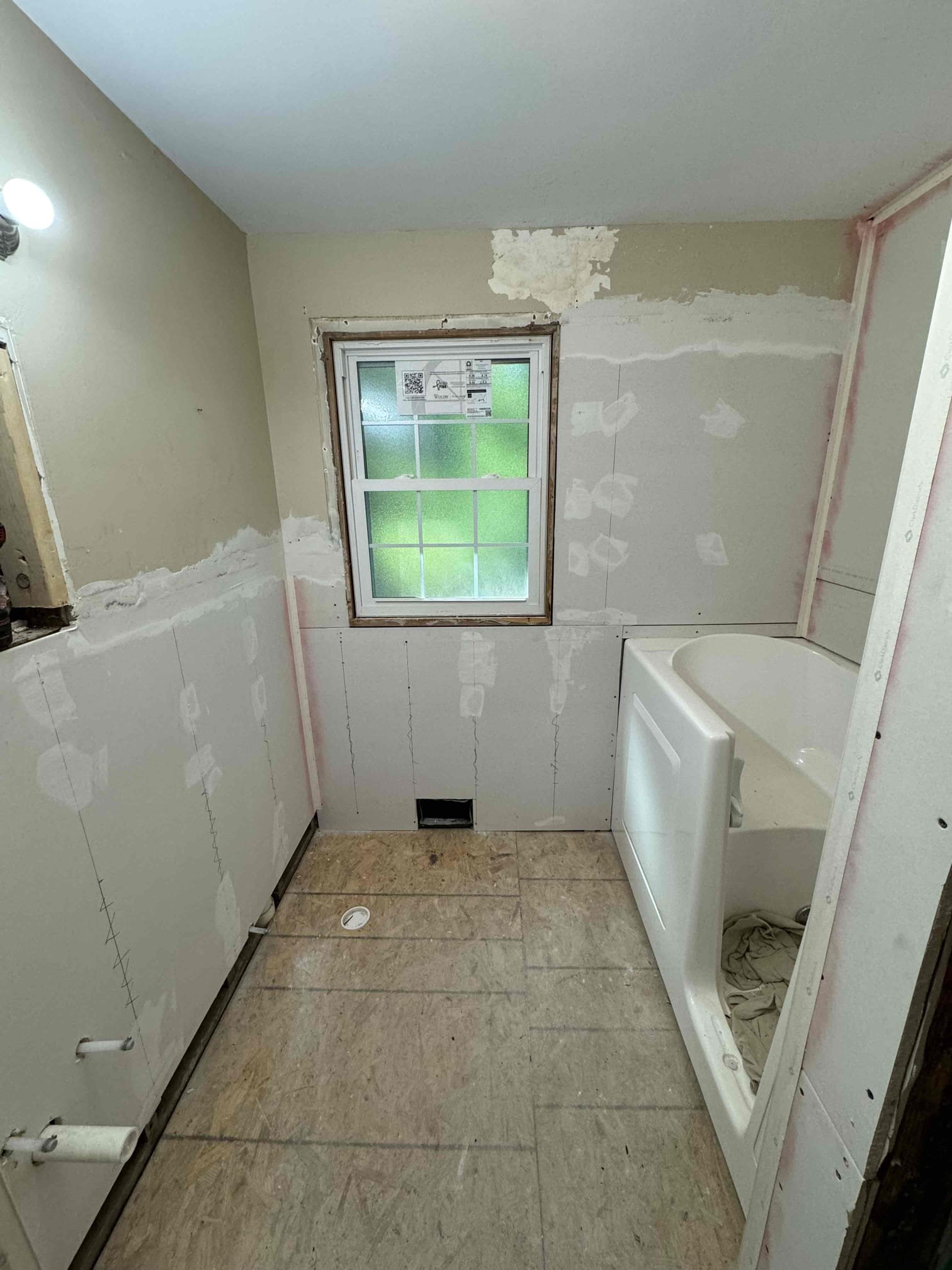 Before and after bathroom remodel in Spartanburg showcasing a fresh look.